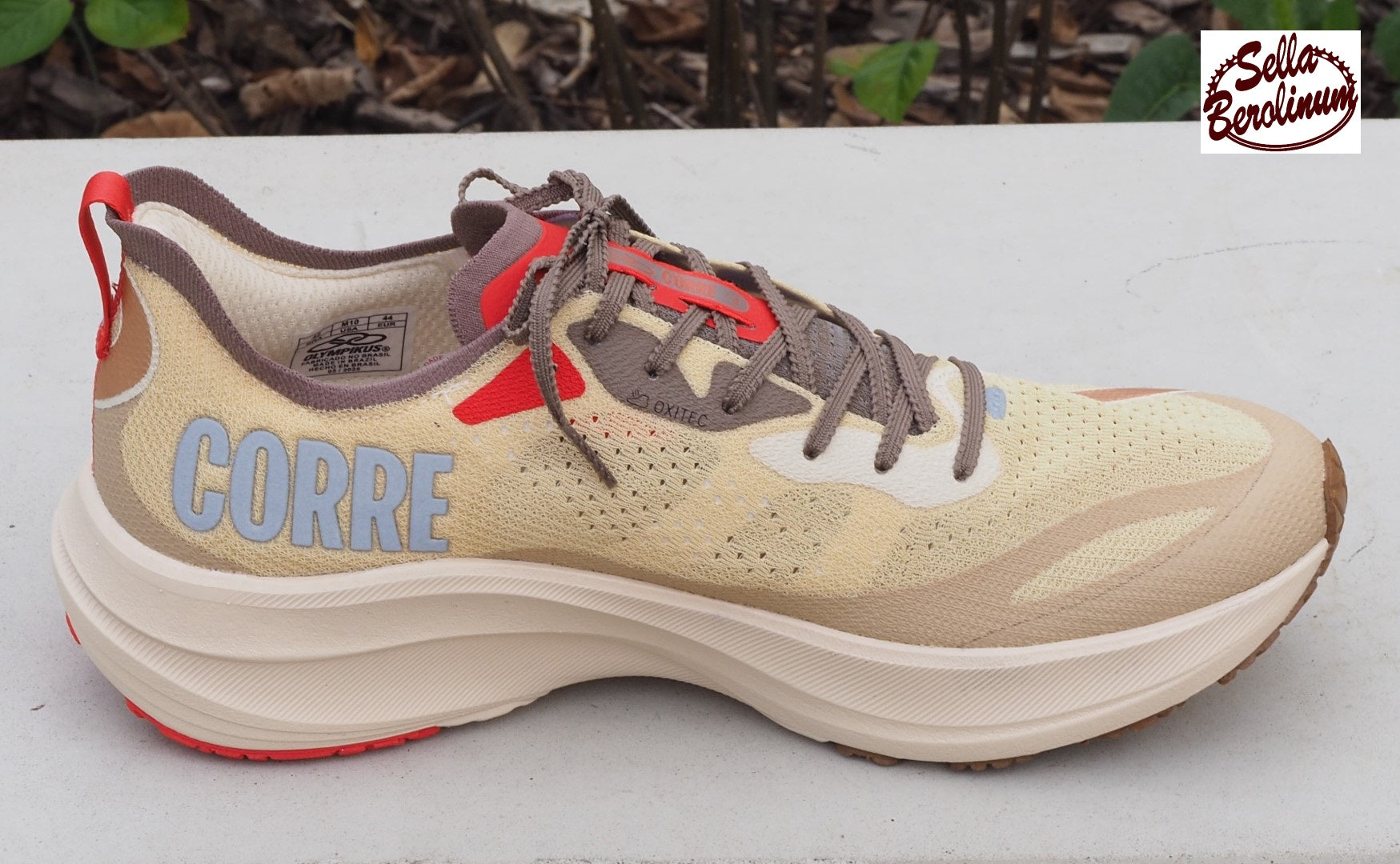 Olympikus Corre 4 Laufschuh in Beige und Sand mit roten Akzenten und Eleva Pro 2.0 Zwischensohle, Seite Innen